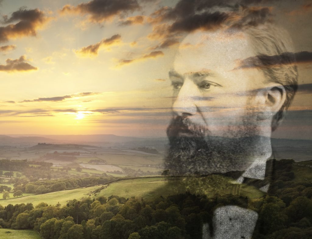 Sunset over Wessex landscape with image of Thomas Hardy superimposed over it