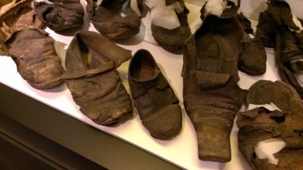 Collection of concealed shoes from East Anglia, held by St Edmundsbury Heritage Service, via WikiCommons.